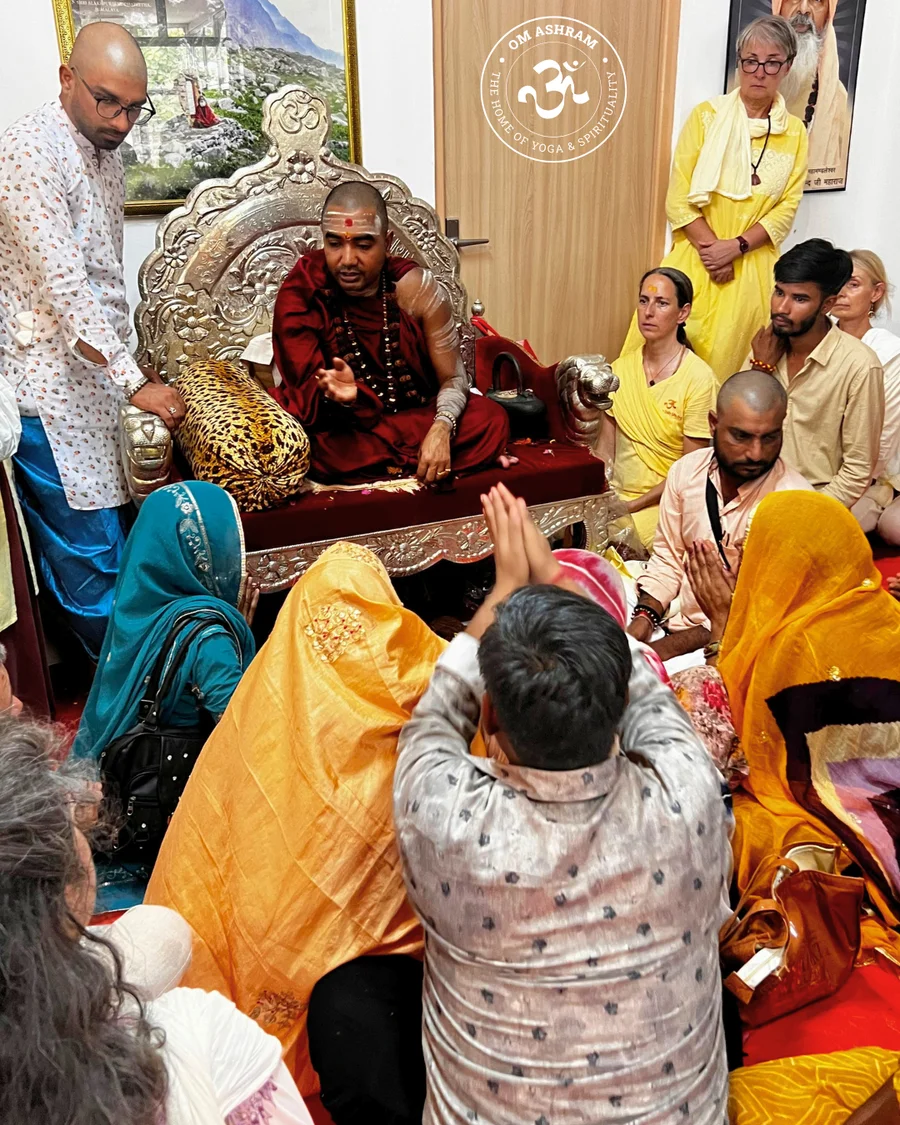 A disciple receiving a personal mantra from the Guru.
